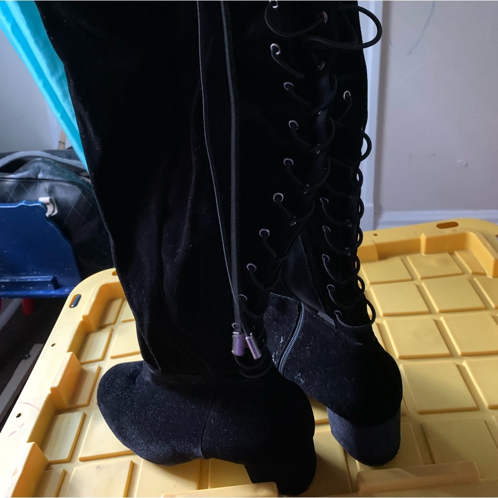 Torrid Knee high lace up plus size boots